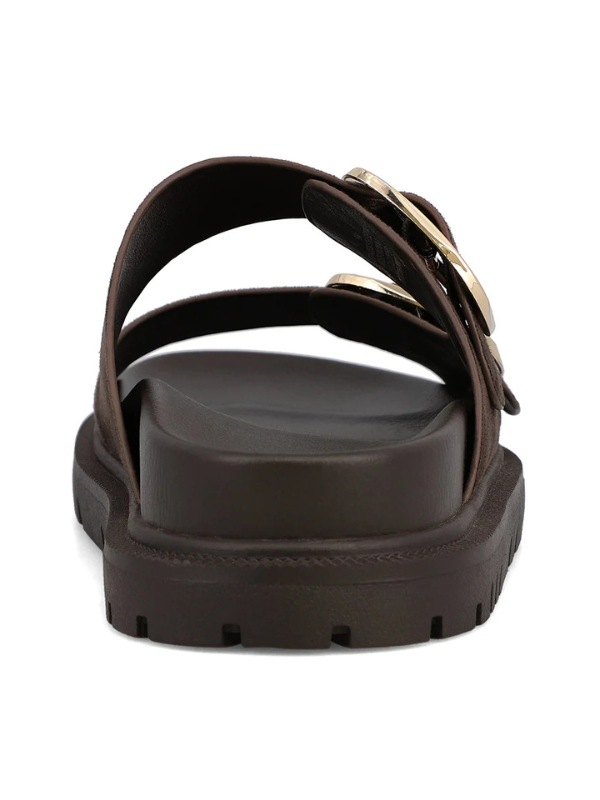 Brown sandal with multiple straps on a white background