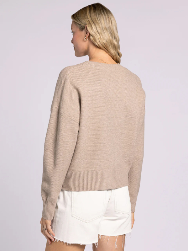 woman wearing taupe cardigan