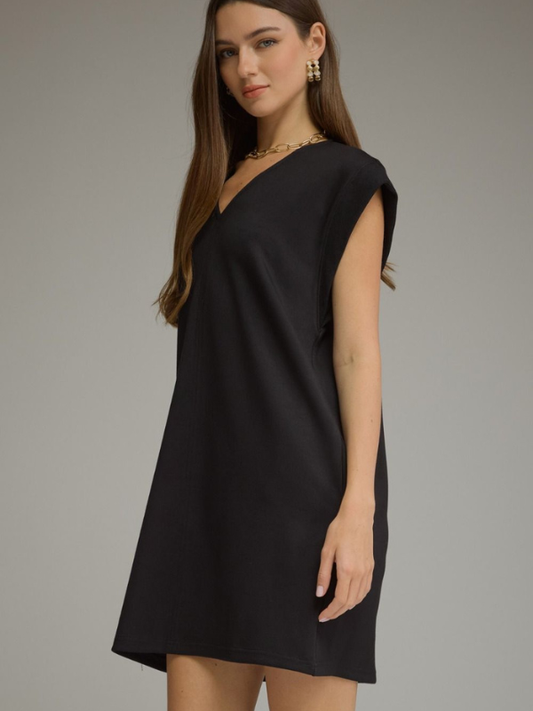 woman wearing a black mini dress