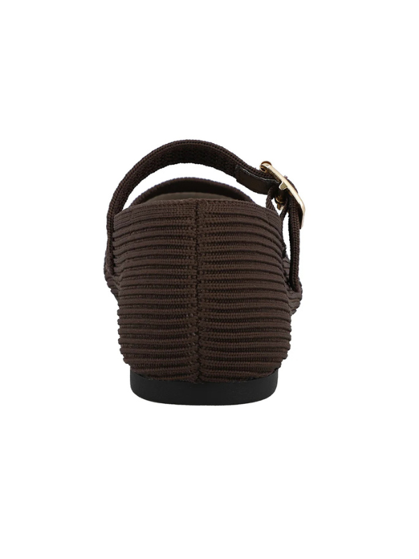 Brown sandal with a strap on a white background