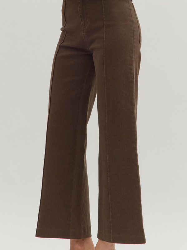 Brown pants on a plain background