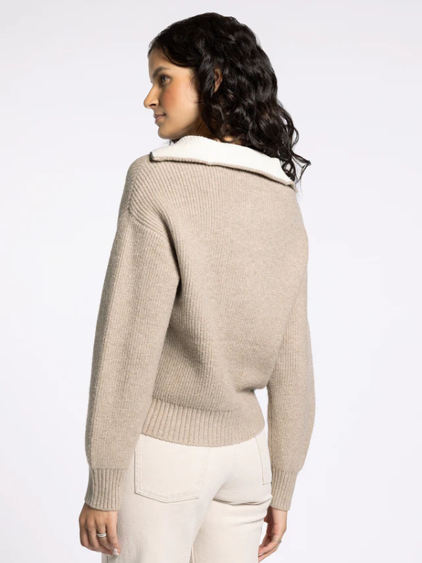 woman wearing sweater