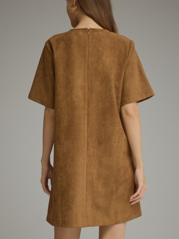 woman wearing a cognac suede type dress