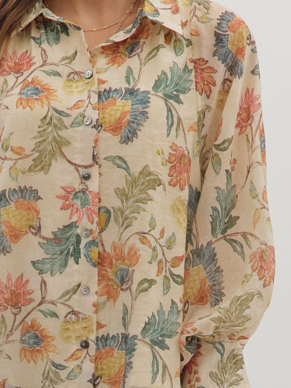 Floral patterned shirt with colorful flowers on a beige background
