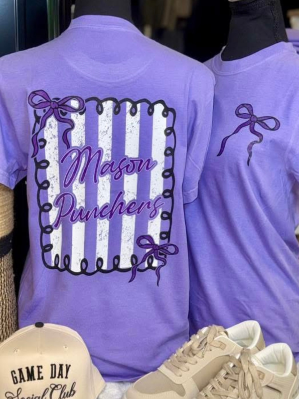 Purple t-shirt with 'Mason Punchers' design and sneakers on a mannequin.
