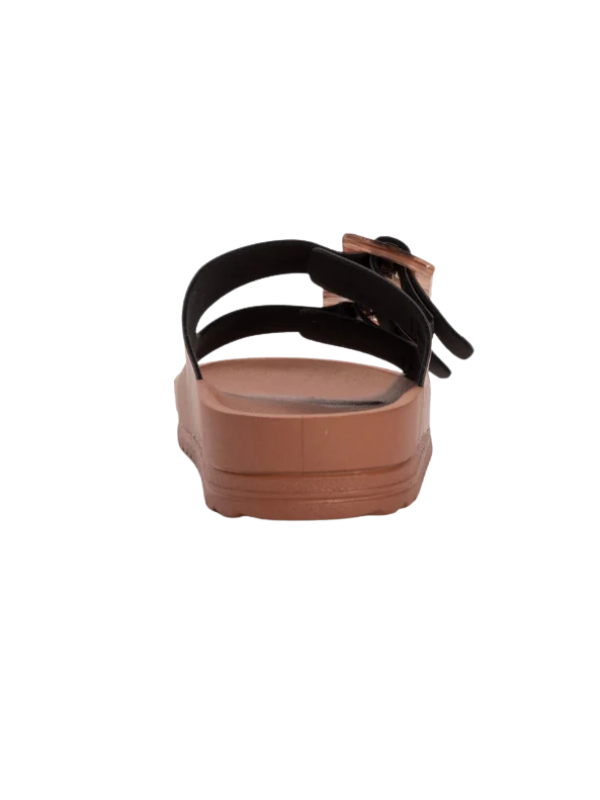 Brown sandal with black straps on a white background