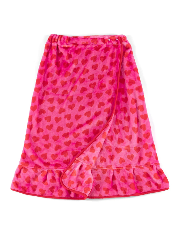 Pink skirt with red heart pattern on a white background