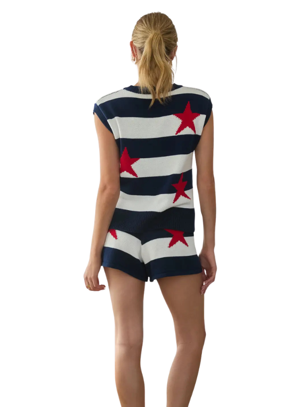 woman wearing a striped top with red stars