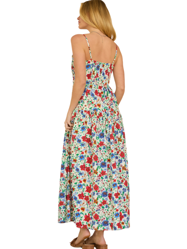 Woman wearing a floral dress on a white background