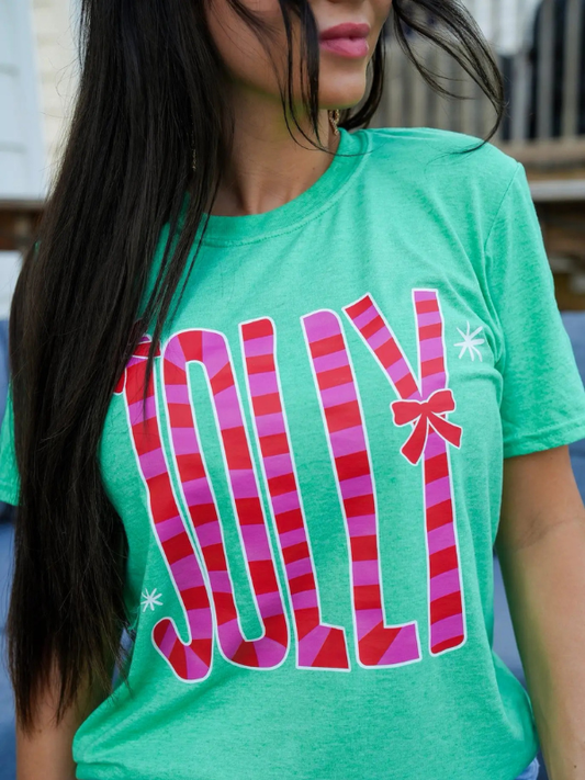 Green t-shirt with colorful 'Jolly' design worn by a person