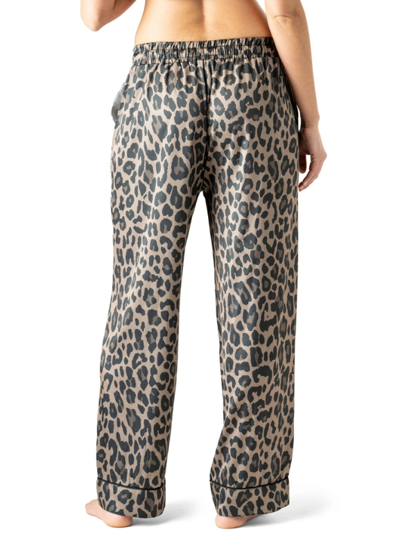 Leopard print pajama pants on a white background