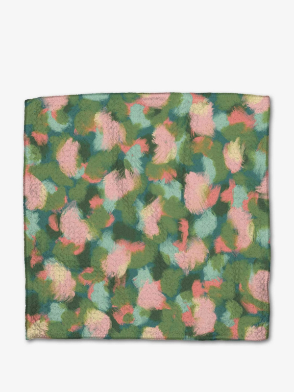 Floral patterned fabric square on a white background