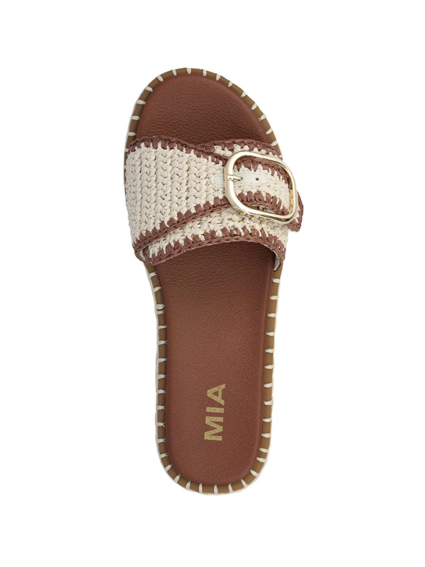 Woven sandal with brown buckle on a white background