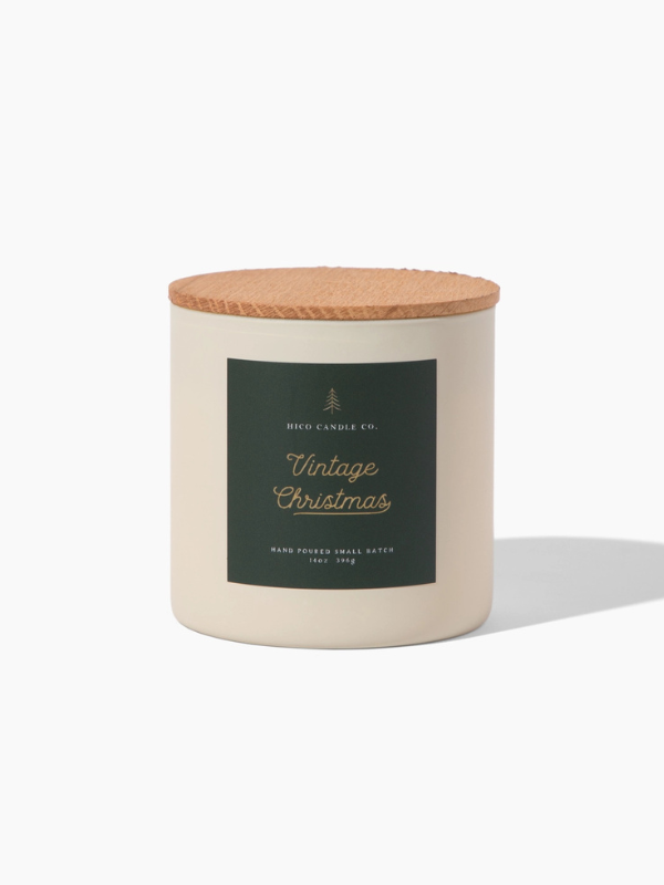 Candle with a wooden lid on a white background