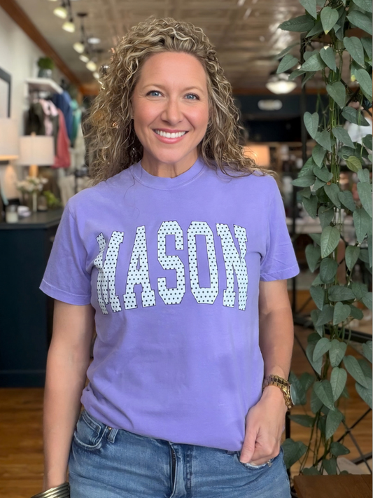 woman wearing violet tee that says Mason 
