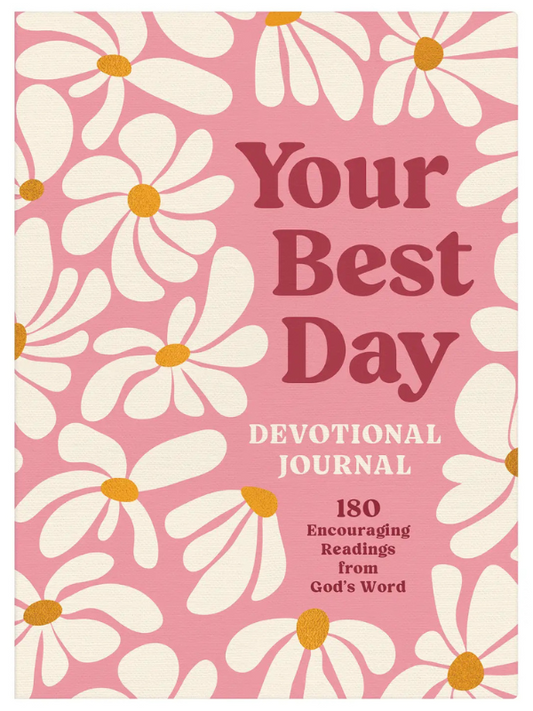 Pink devotional journal cover with white daisies and text