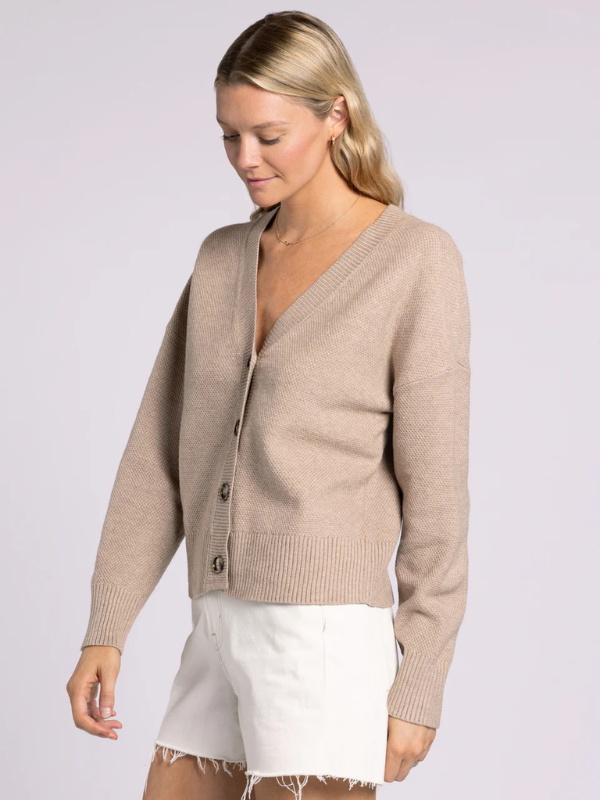 woman wearing taupe cardigan