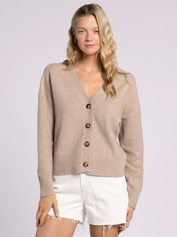 woman wearing taupe cardigan