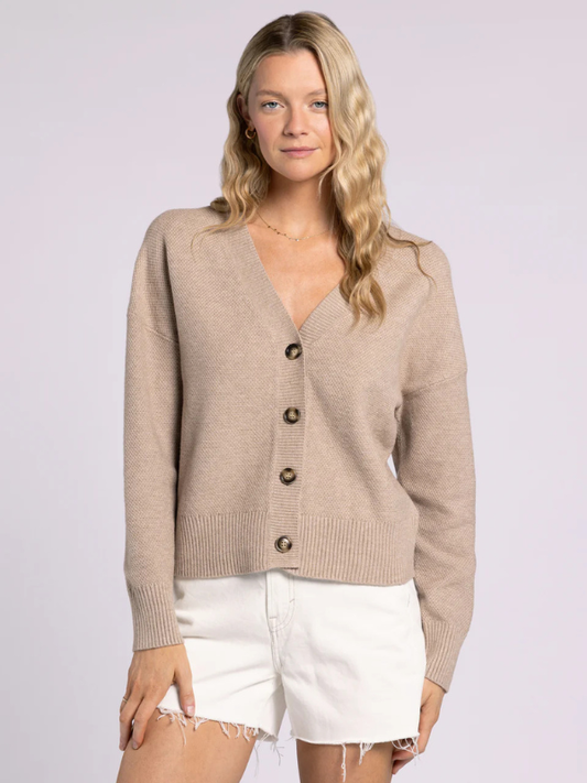 woman wearing taupe cardigan