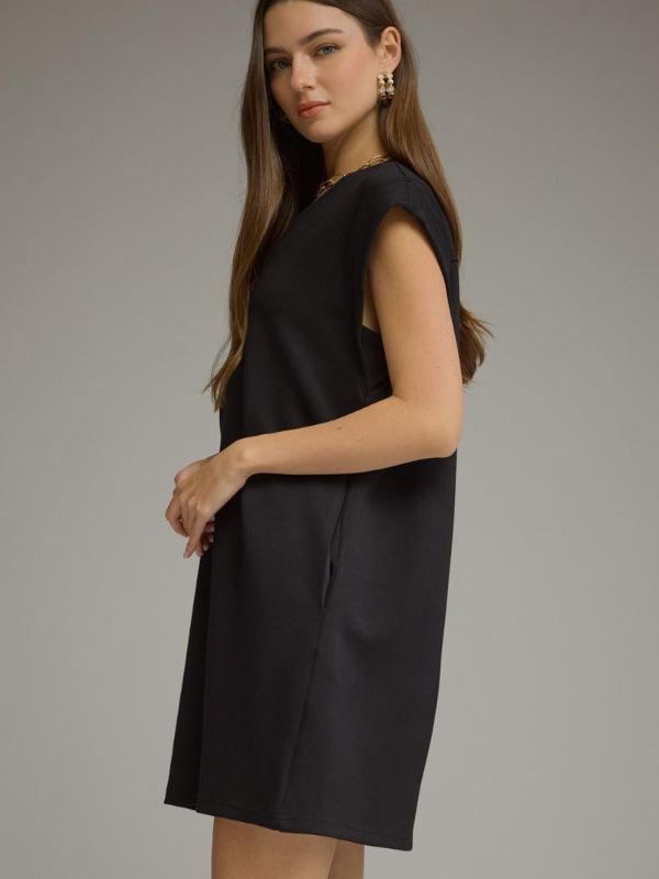 woman wearing a black mini dress 