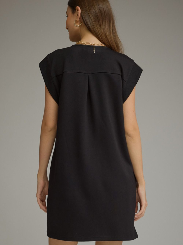 woman wearing a black mini dress 