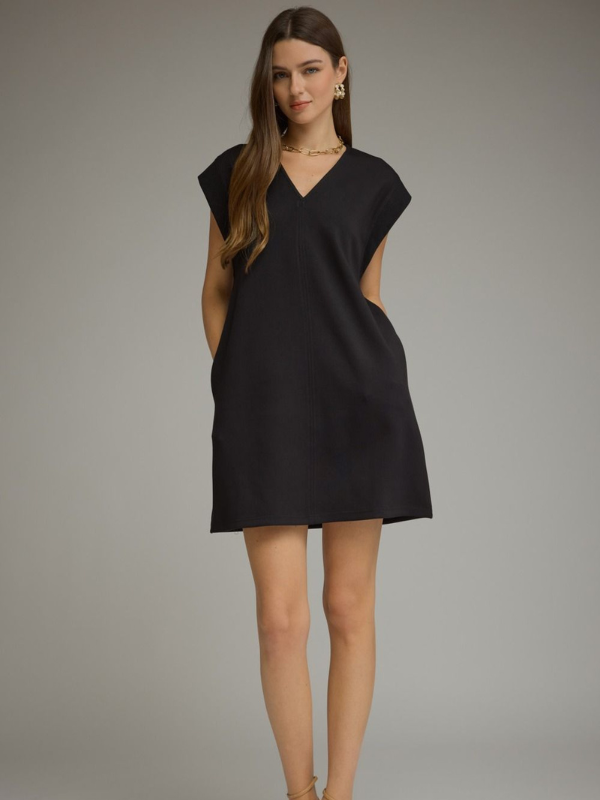 woman wearing a black mini dress 