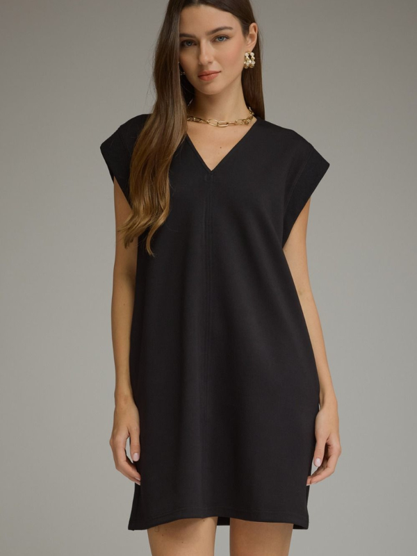woman wearing a black mini dress 