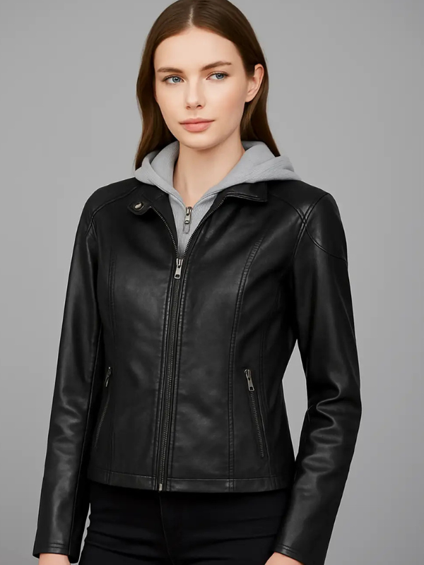 Woman wearing a black leather jacket on a gray background