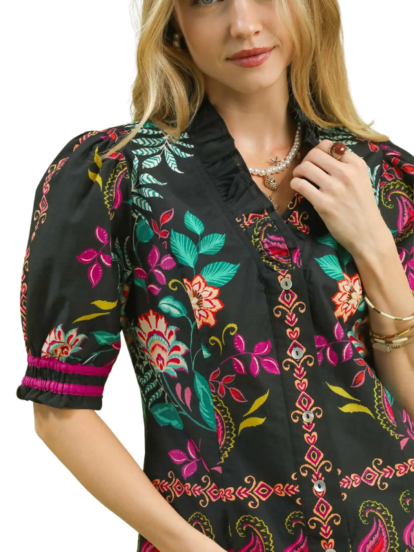 woman wearing black and pink floral top