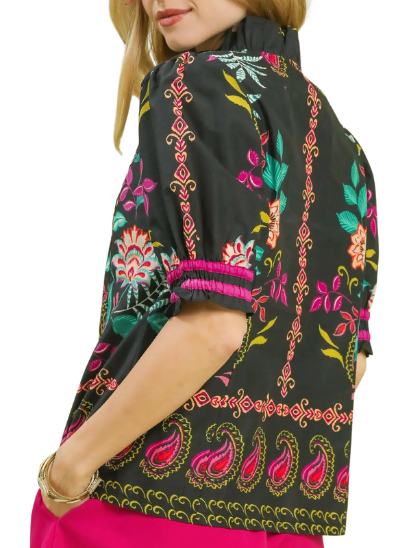 woman wearing black and pink floral top