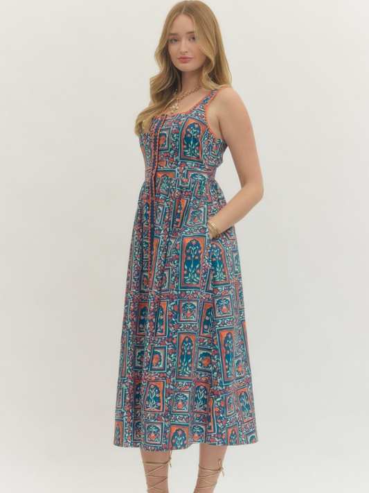 Woman wearing a patterned dress on a white background