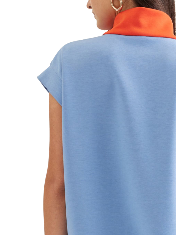 Light blue sleeveless top with orange collar on a white background