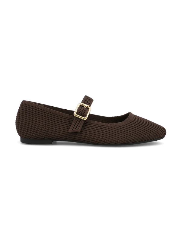 Brown flat shoe with a gold buckle on a white background