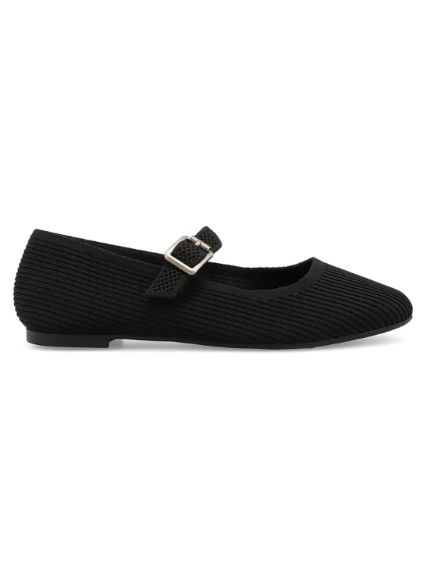 Black ribbed ballet flat shoe with a buckle on a white background