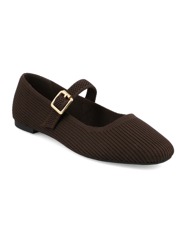 Brown ribbed ballet flat shoe with a gold buckle on a white background