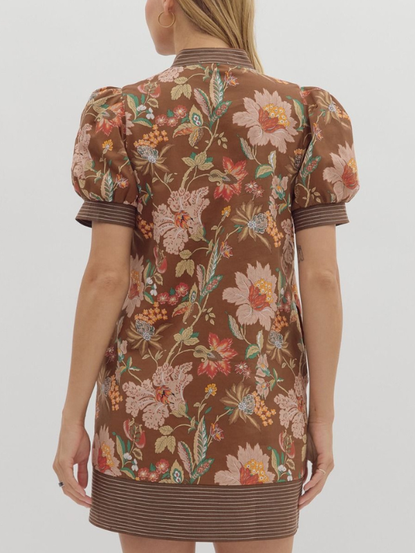 Woman wearing a brown floral 