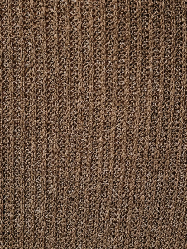 woman wearing a brown knit sweater and jeans