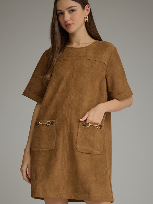woman wearing a cognac suede type dress