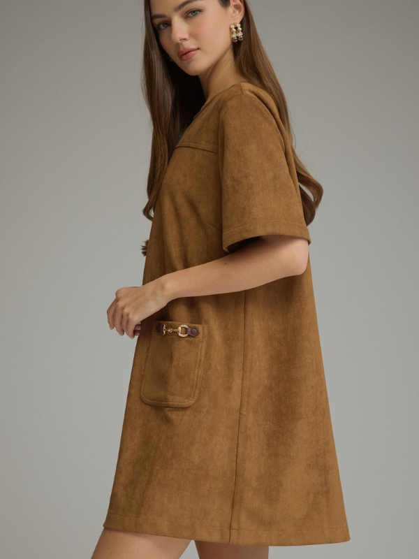 woman wearing a cognac suede type dress