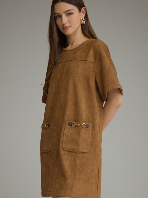 woman wearing a cognac suede type dress