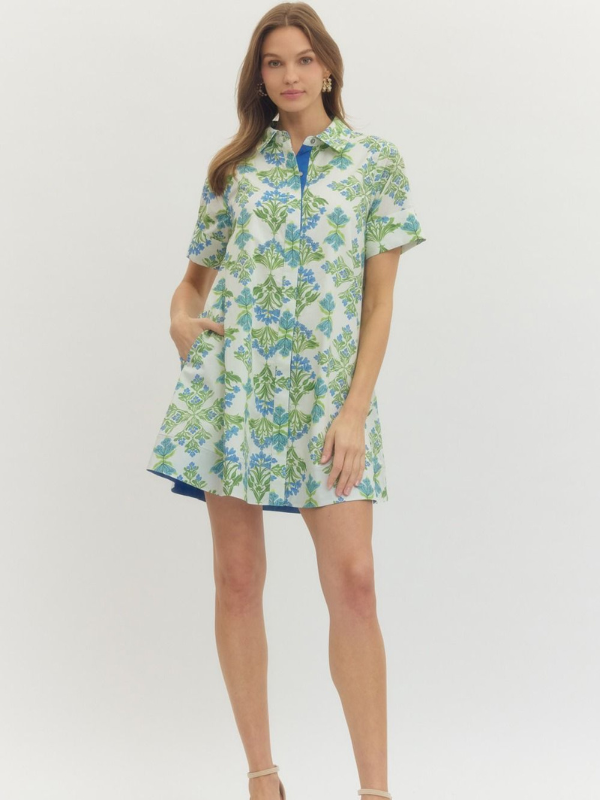 Woman wearing a floral dress on a white background