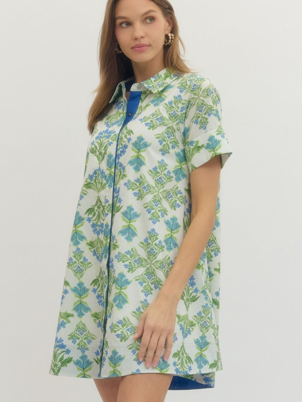 Woman wearing a floral dress with a white background