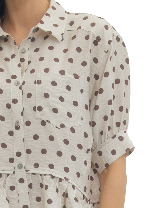 Polka dot shirt with brown dots on a beige background
