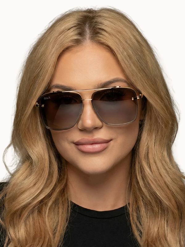 Person wearing sunglasses with a neutral background