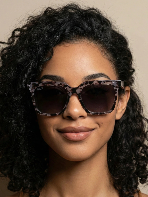 sunglasses with grey cheetah frames and black lenses 