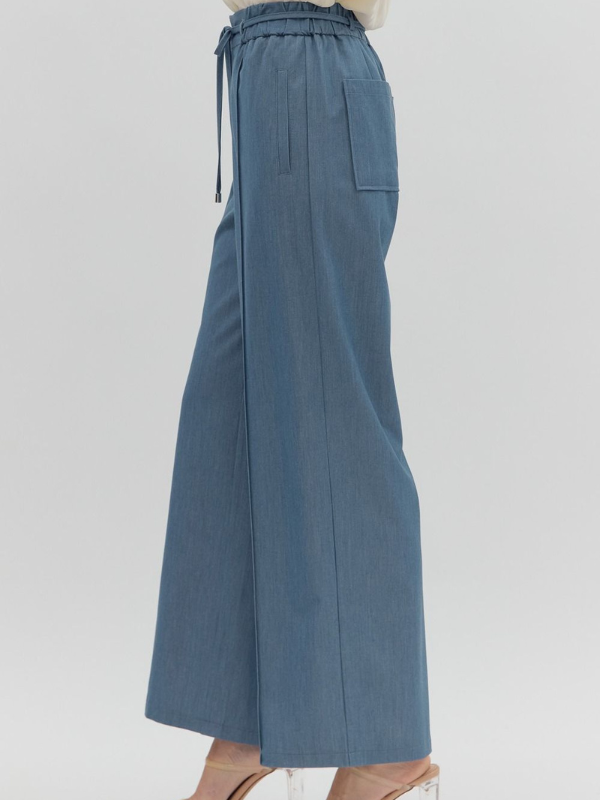 Blue wide-leg pants on a white background