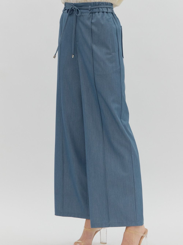 Blue wide-leg pants on a white background
