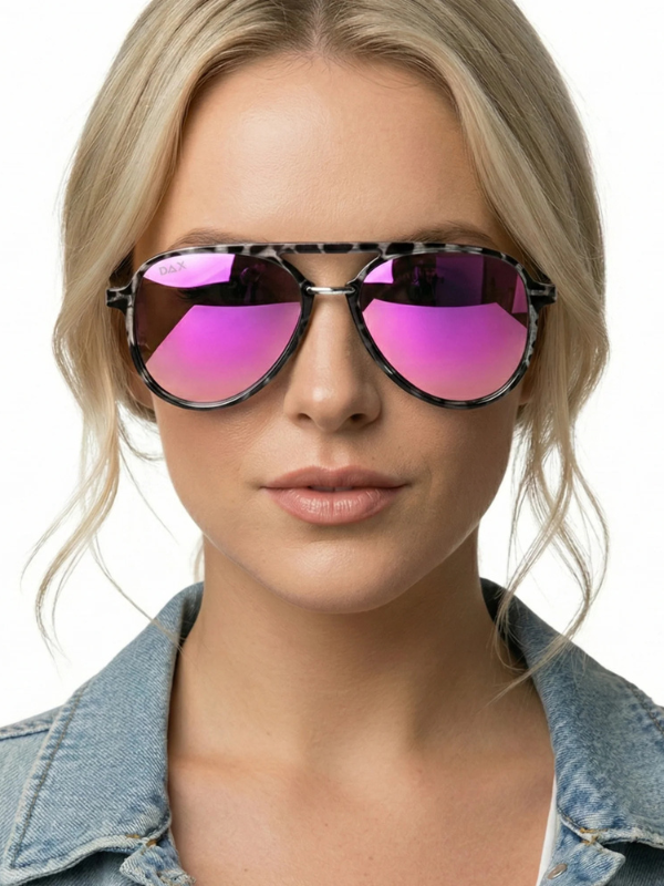 woman wearing black tortoise sunglasses with hot pink lenses 