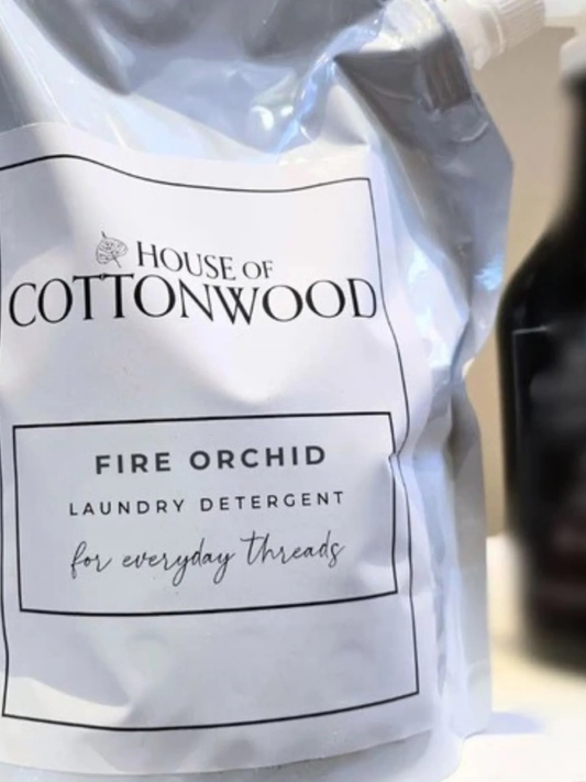 House of Cottonwood laundry detergent package with 'Fire Orchid' scent