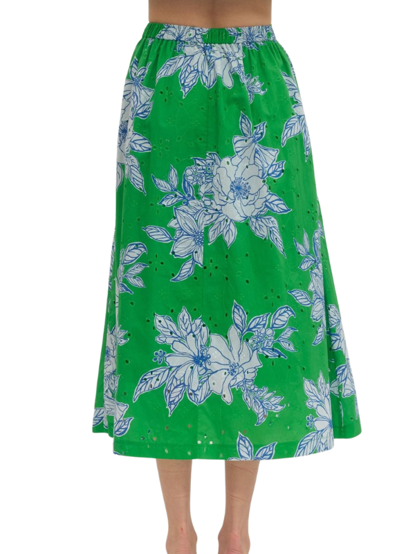 Green skirt with floral pattern on a white background